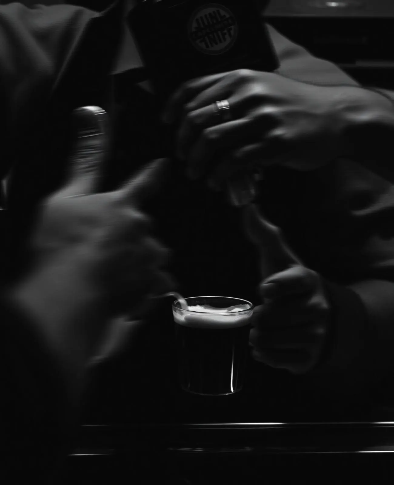 Hands preparing coffee in natural light